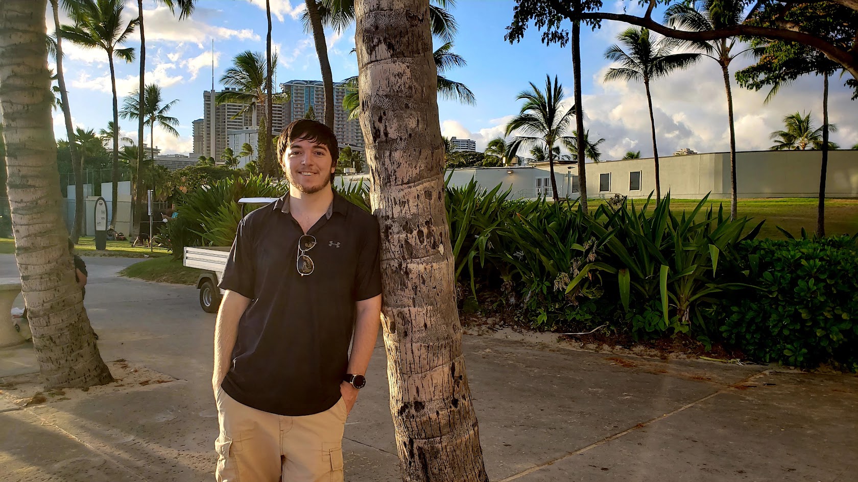 Leaning against Palm Tree
